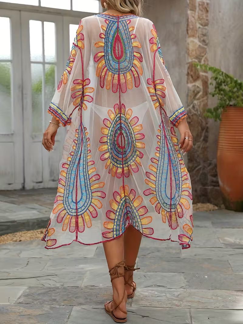 Kimono bohème de plage radieux — Vogue Française