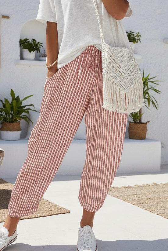 Pantalon large à rayures — Vogue Française