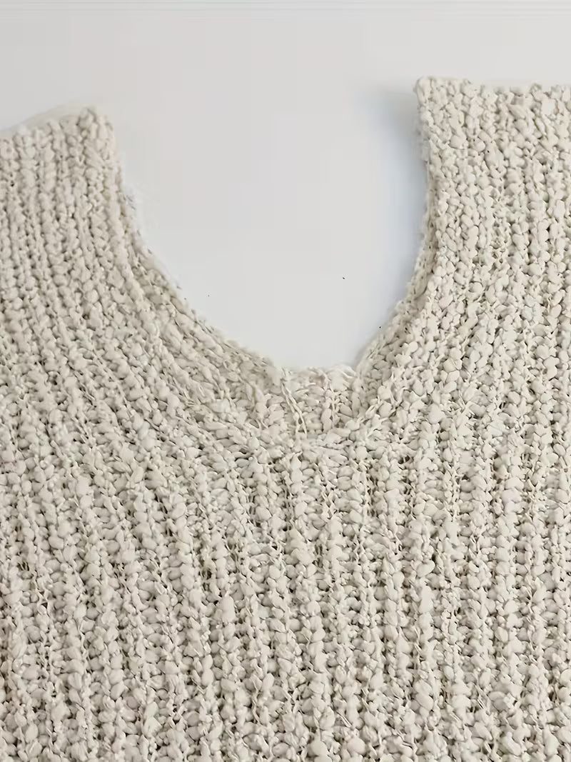 Pull élégant loose en tricot léger — Vogue Française